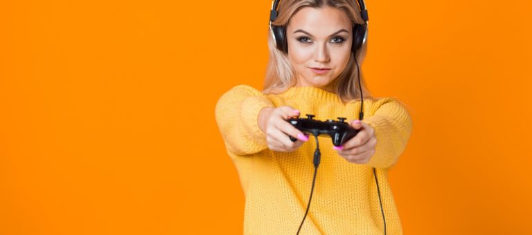 attractive gamer single infront of orange background