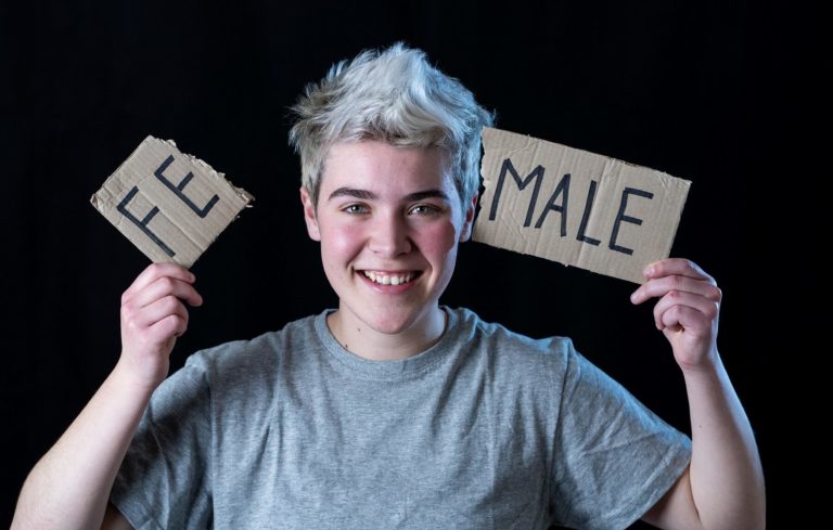 trans person rips label 'female'