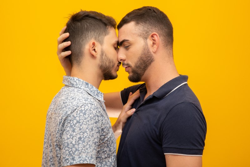 attractive gay men almost kiss