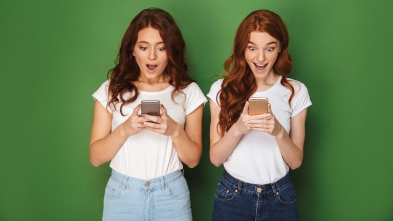 two girls write on dating apps