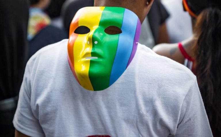 mask in pride colors