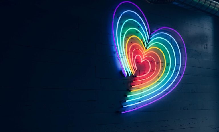 neon heart in LGBT pride rainbow colors