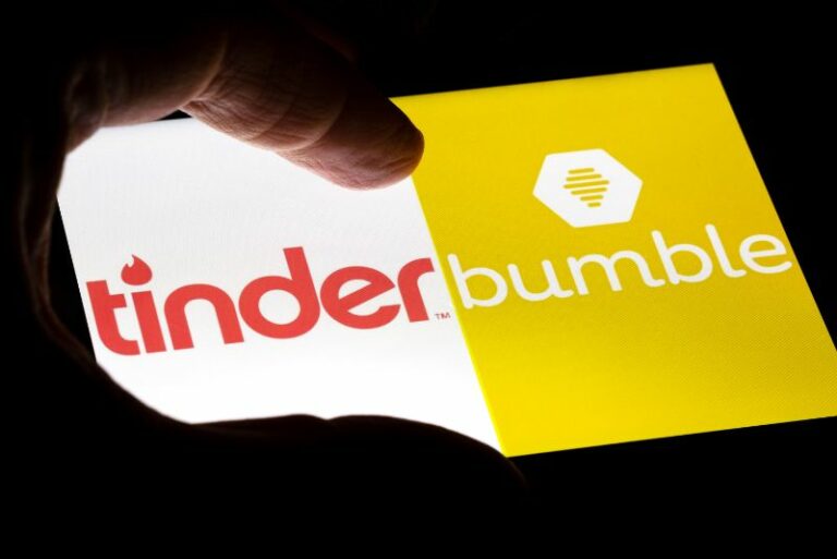 Someone comparing bumble and tinder on a tablet device