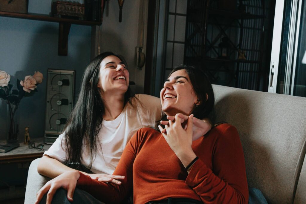 Woman dating a blind person cuddling on the couch