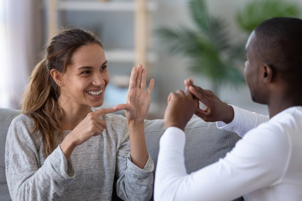 Using sign language when dating a mute person